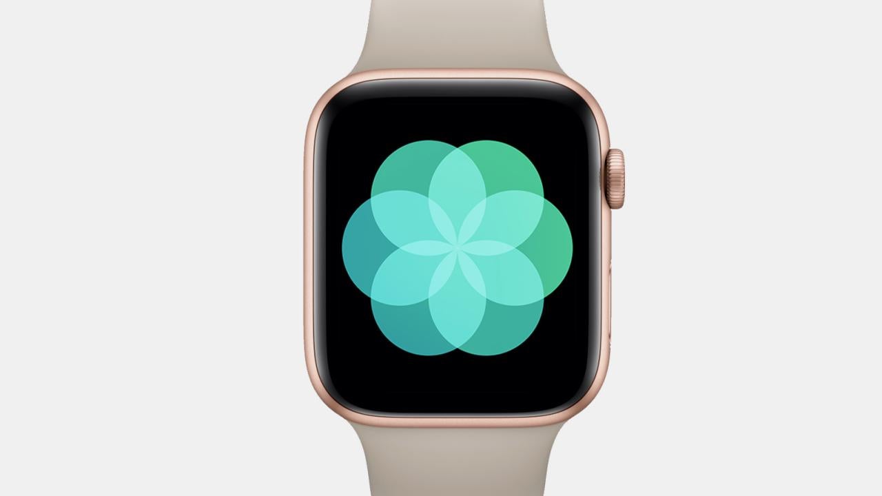 Product photo of Apple Watch with green floral graphic onscreen.
