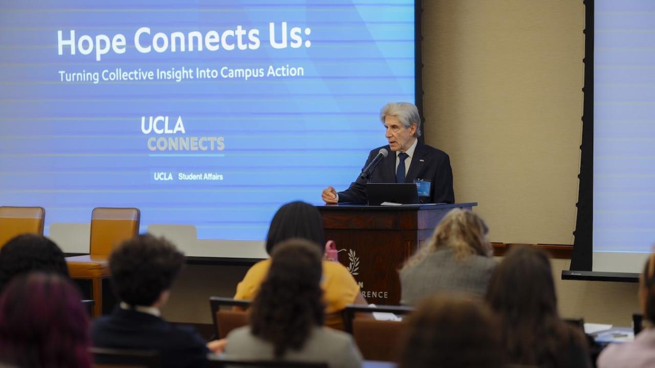 Julio Frenk delivers remarks at a podium at the Hope Connects Us launch on UCLA campus.