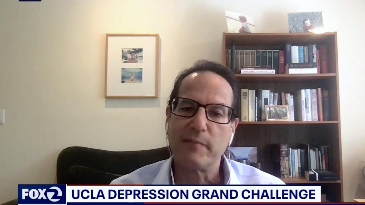 Nelson Freimer speaking via webcam. A chyron below him reads "UCLA Depression Grand Challenge"