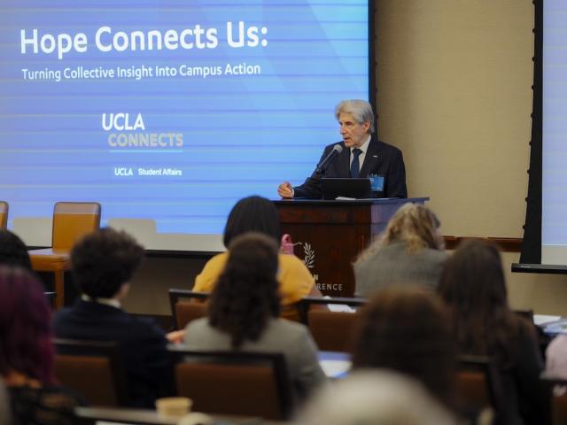 Julio Frenk delivers remarks at a podium at the Hope Connects Us launch on UCLA campus.
